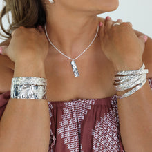 Load image into Gallery viewer, 92.5 Sterling Silver Isla 15mm Plumeria &amp; Scroll Cut-Out Bangle
